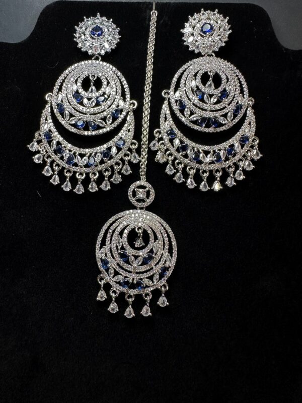 Own the Spotlight: Dazzle in this Mehram Chandbali Earrings & Tikka Set