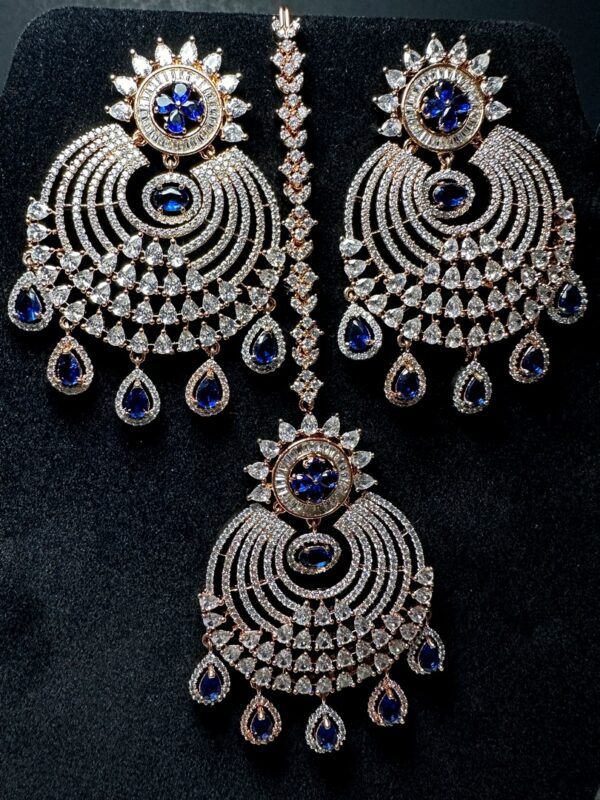 Own the Spotlight: Dazzle in this Mehram Chandbali Earrings & Tikka Set