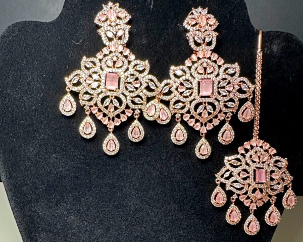 Own the Spotlight: Dazzle in this Mehram Chandbali Earrings & Tikka Set