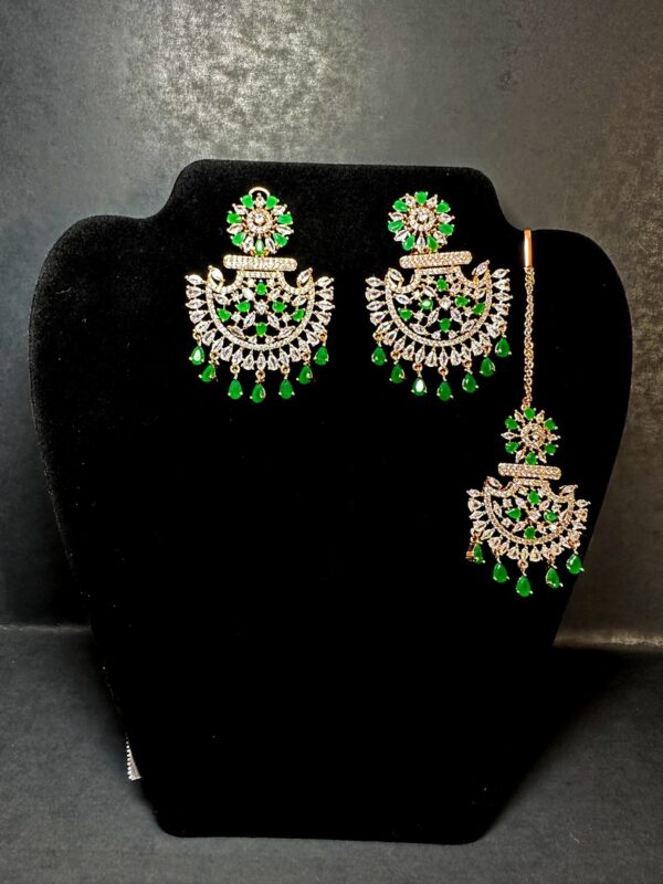 Own the Spotlight: Dazzle in this Mehram Chandbali Earrings & Tikka Set