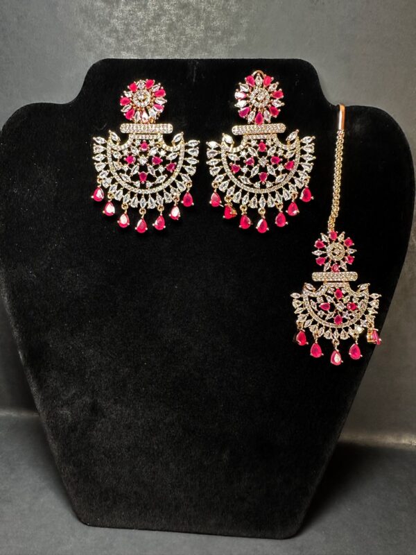 Own the Spotlight: Dazzle in this Mehram Chandbali Earrings & Tikka Set