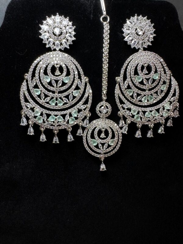 Own the Spotlight: Dazzle in this Mehram Chandbali Earrings & Tikka Set